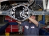 mechanic working on rear differential